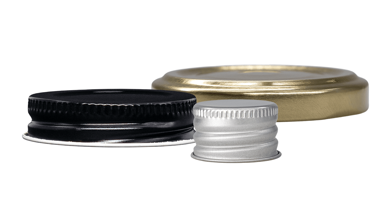 A group of metal caps including a lug finish metal cap, a CT metal cap and a ribbed metal cap.